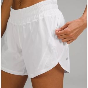 Lululemon track that 5 inch white shorts !!